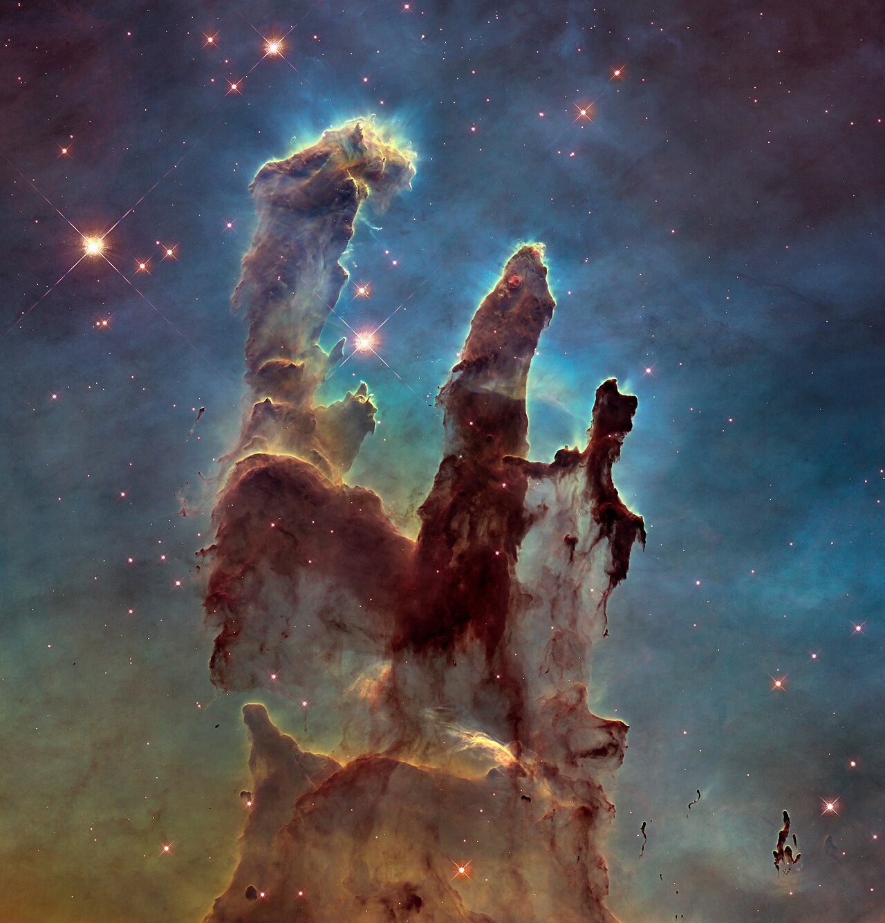 Pillars of Creation — Hubble — 3I/ATLAS : une comète venue d'ailleurs glacial